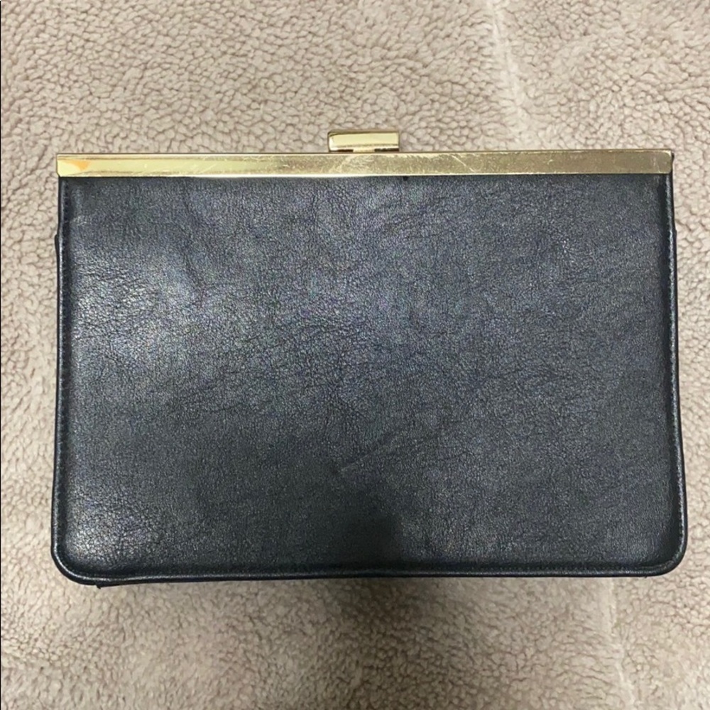 Black and gold clutch purse MAKE AN OFFER❗️